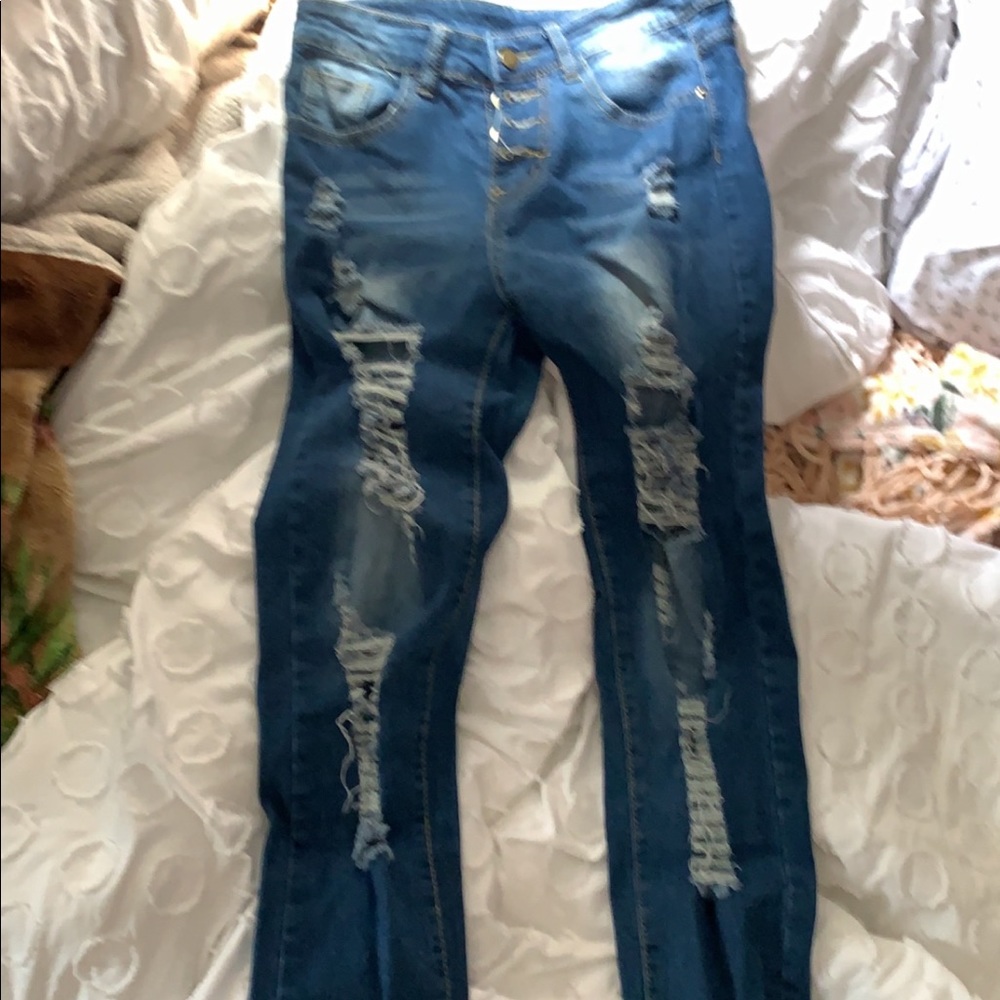Blue jeans, size small equivalent to a 4 according to size guide.